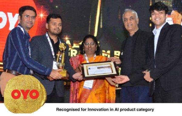 OYO receiving the Innovation in AI Product award at the Aegis Graham Bell Awards